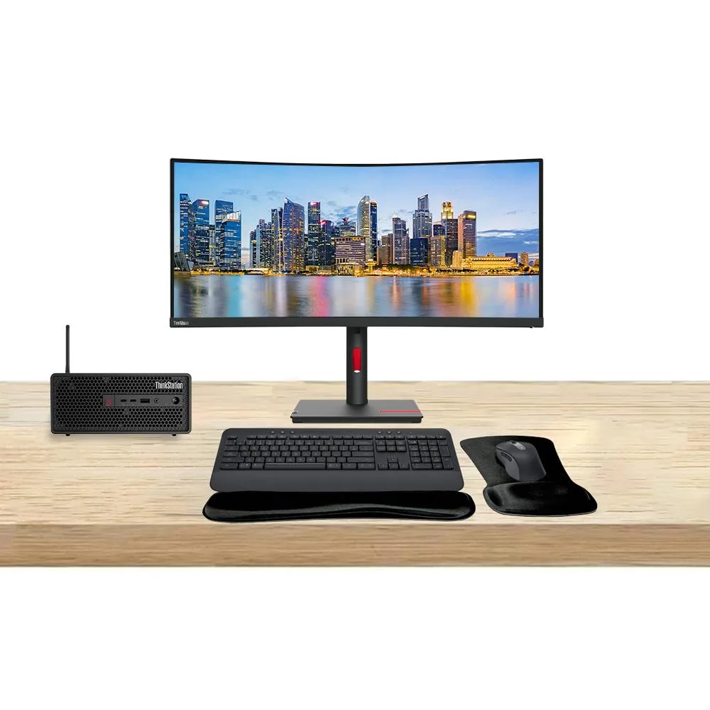 Compact black SFF desktop, 34-inch curved ultrawide monitor, graphite wireless keyboard and mouse with gel wrist pad