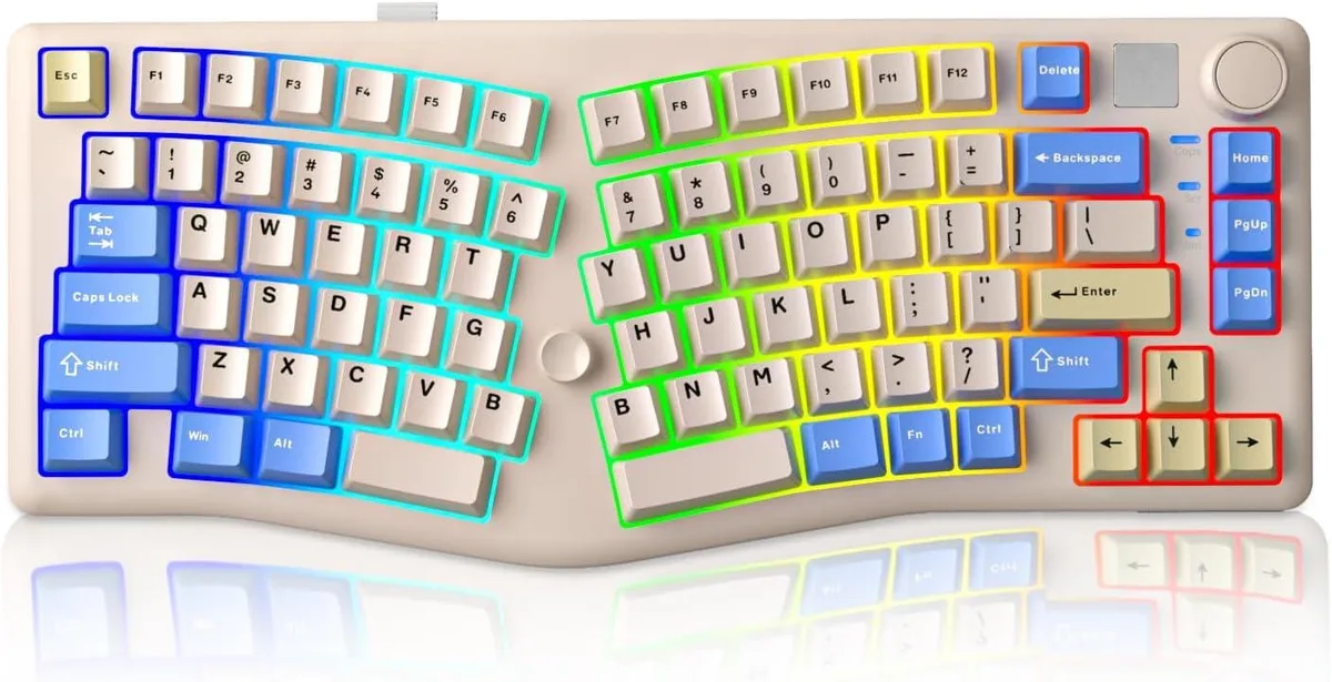 Compact Alice-layout gaming keyboard with ergonomic split design, cream finish, rotary knob and joystick cluster
