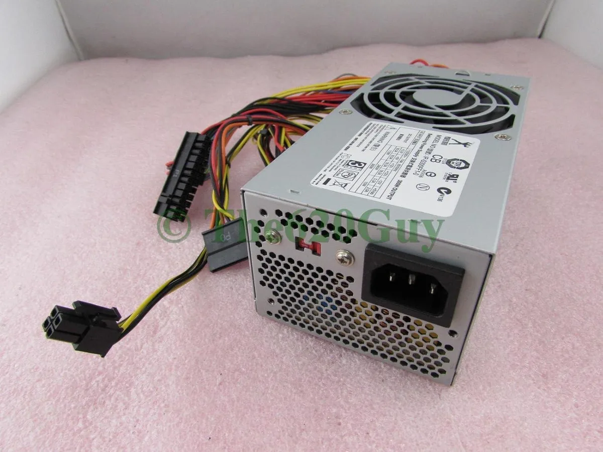 Compact silver TFX power supply unit with side fan grille and multiple cables