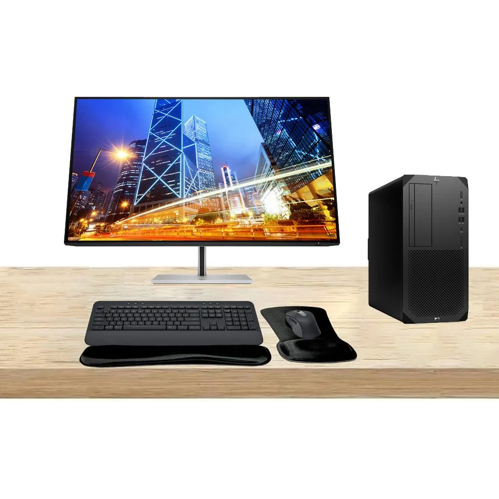 Black HP Z2 G9 tower workstation beside 32-inch 4K monitor with MK650 wireless keyboard and mouse