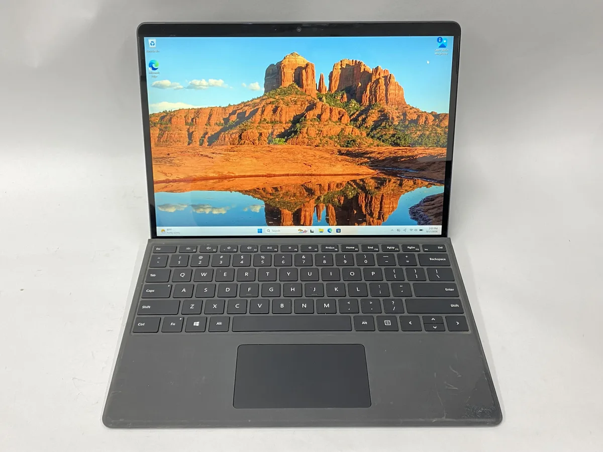 Silver 13 inch touchscreen tablet with kickstand and detachable keyboard