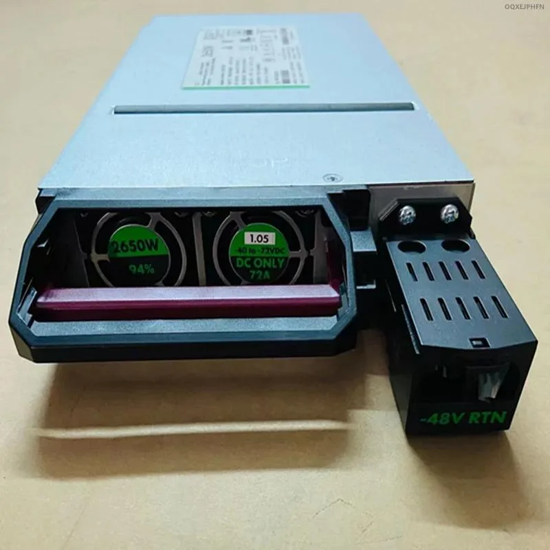 Rectangular silver metal ATX power supply unit with cooling fan and power connectors
