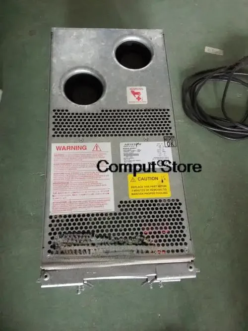 Rectangular black metal ATX power supply unit with ventilation grille and label visible