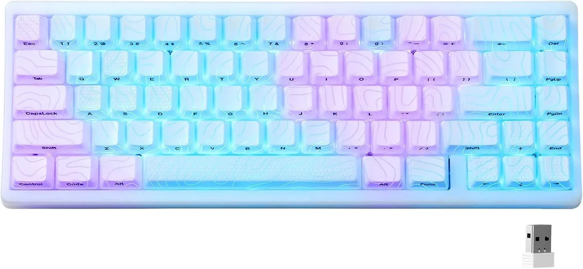 Compact 60 percent mechanical keyboard with JadeStone patterned keycaps and RGB shine-through legends