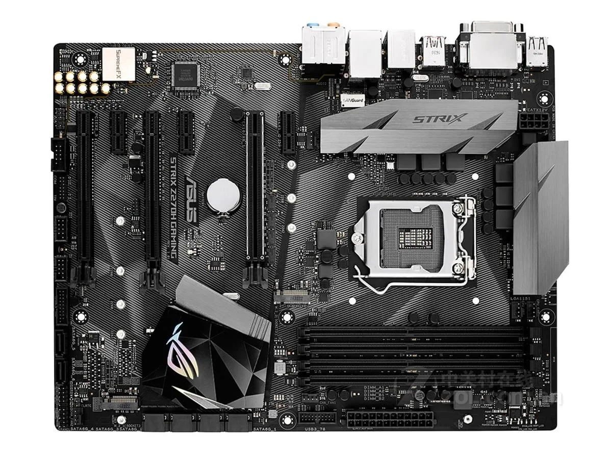 ATX motherboard with black PCB and silver heatsinks