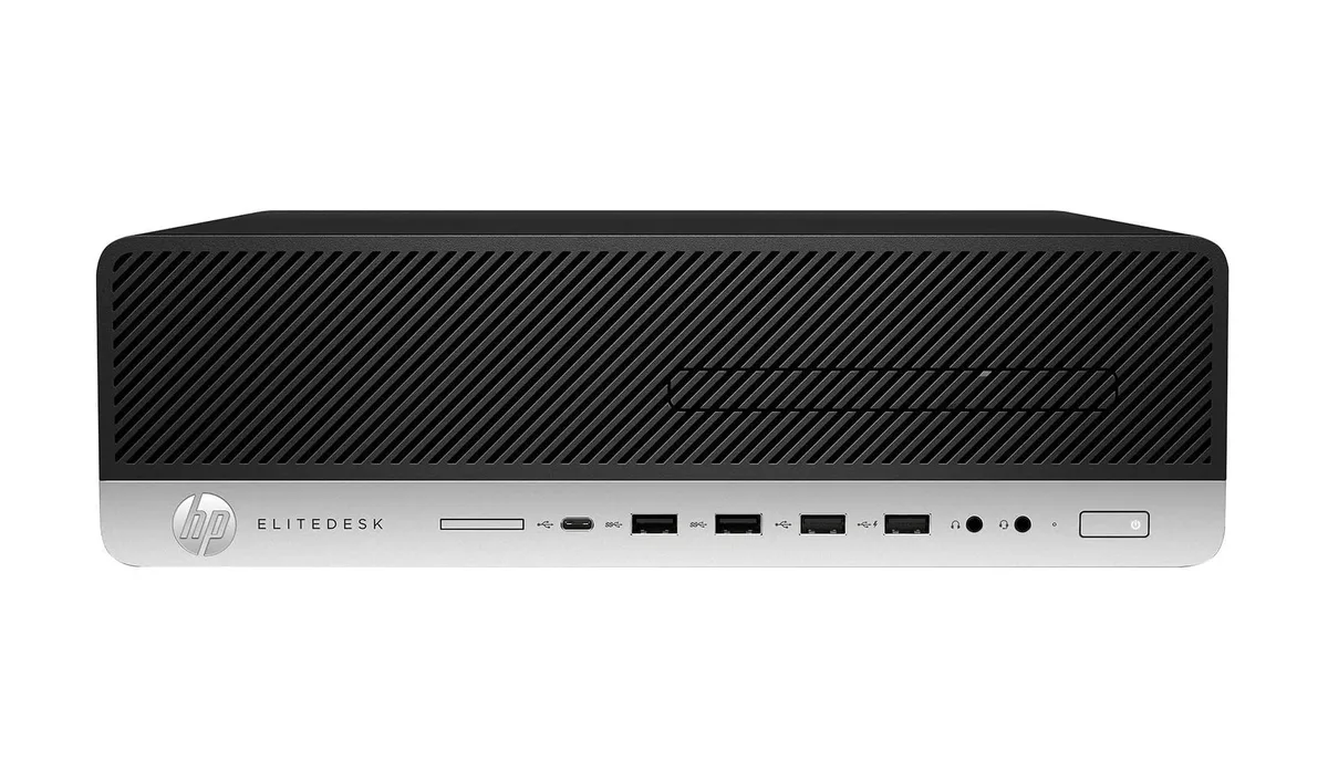 Small black desktop tower, slim form factor, USB keyboard and mouse included