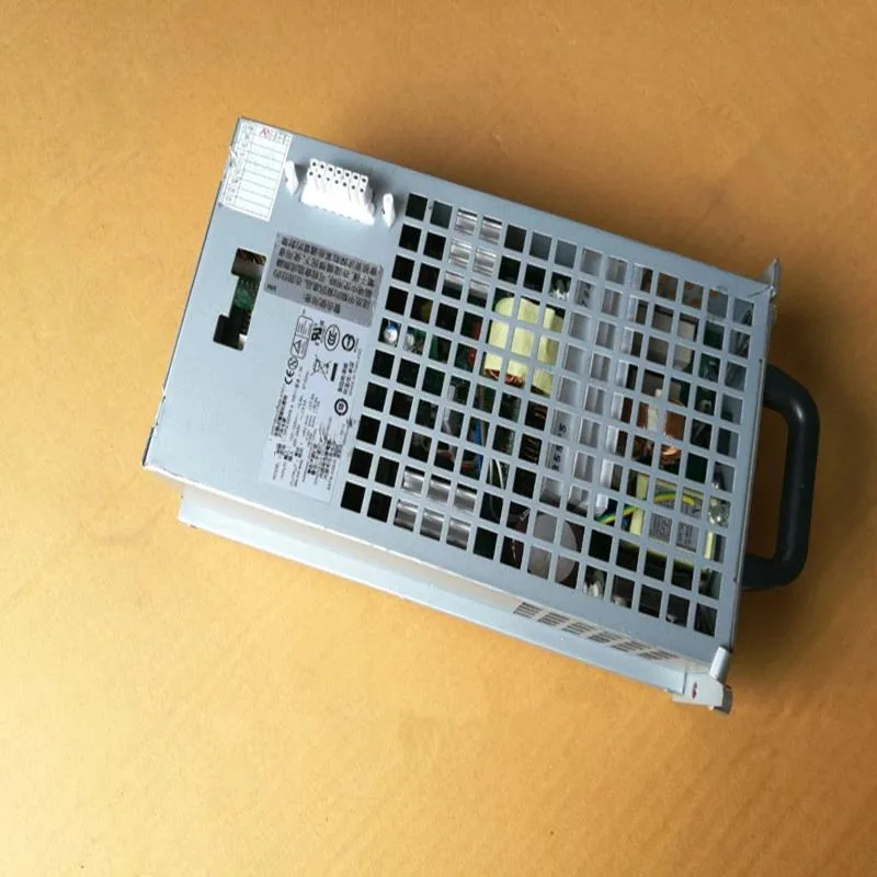 ATX power supply unit in black metal casing with cooling fan and cable bundle