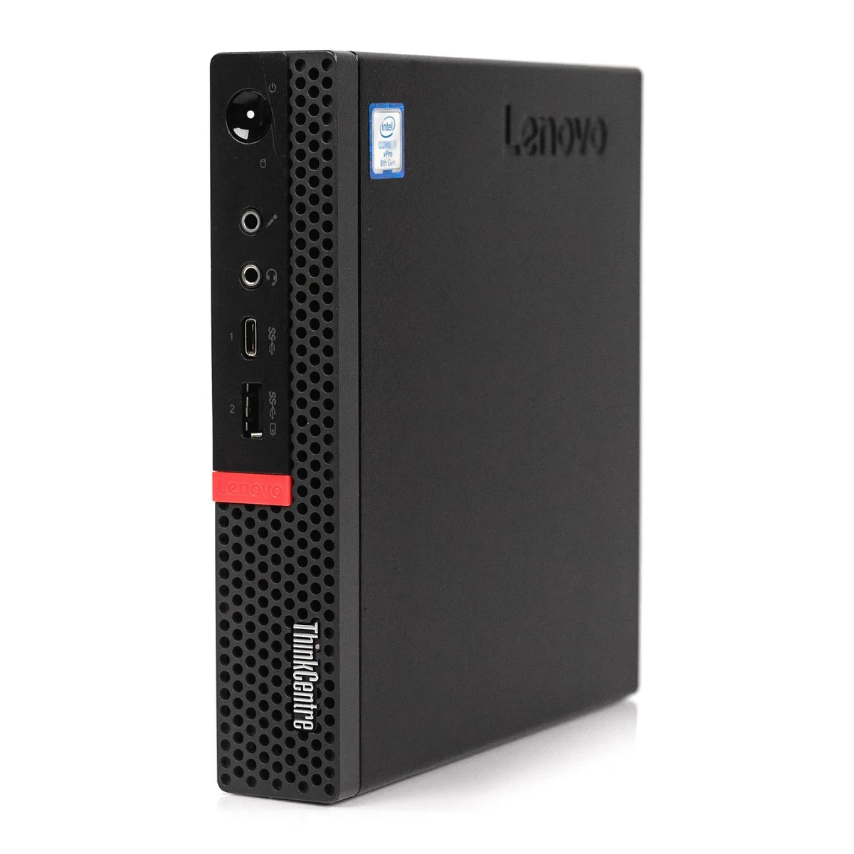 Tiny black Lenovo desktop cube on a plain surface