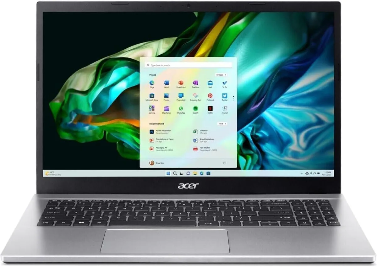 Silver 15.6-inch laptop, slim 0.7-inch profile, matte finish, non-touch FHD display, full-size keyboard, USB-C and HDMI ports visible