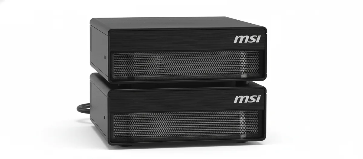 Two compact black Mini PCs side by side with wireless keyboard and mouse