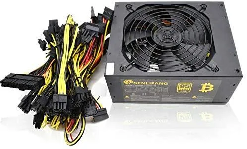 Rectangular ATX power supply unit in matte black metal casing with 140mm dual ball bearing fan grille visible on one side