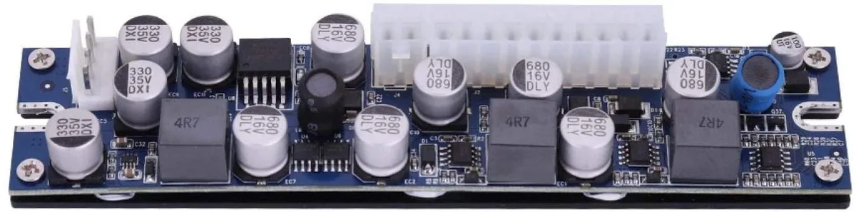Compact rectangular 19V DC-ATX power module, fanless aluminium finish, 155 by 35 by 20 mm
