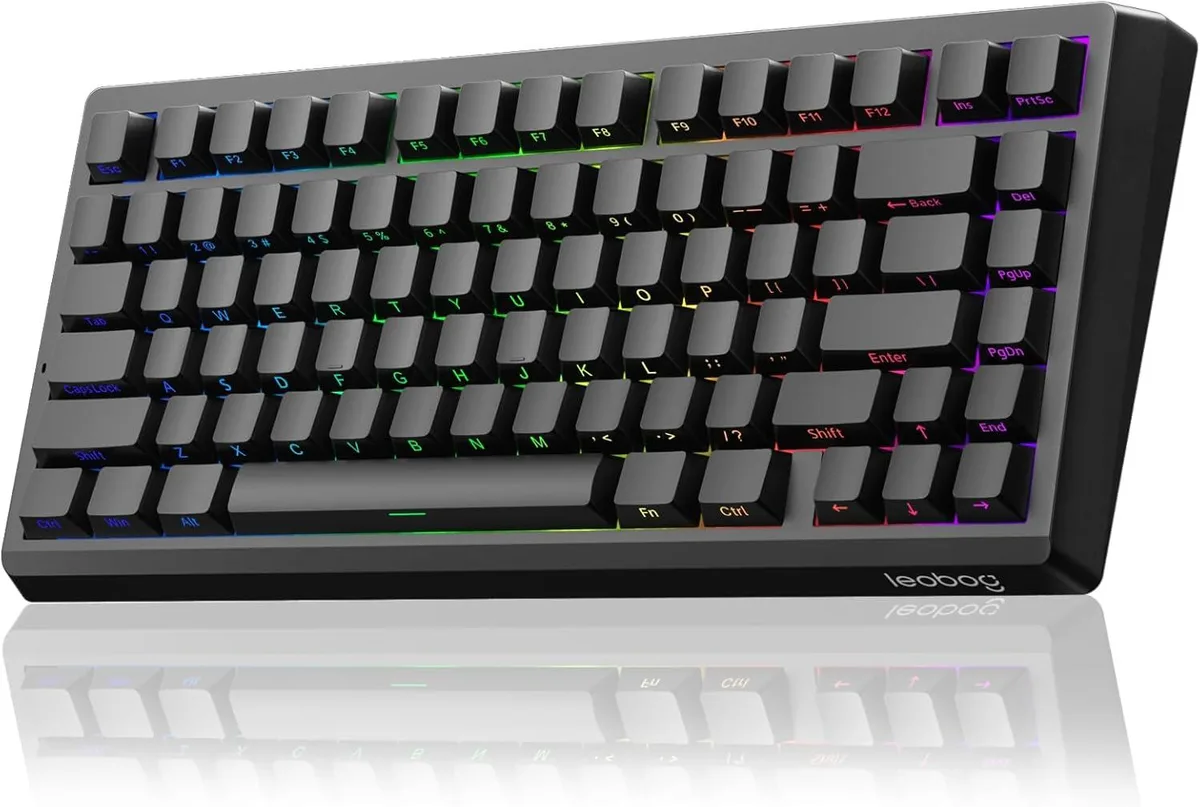 Compact 75% wired gaming keyboard with RGB backlighting and side-engraved keycaps