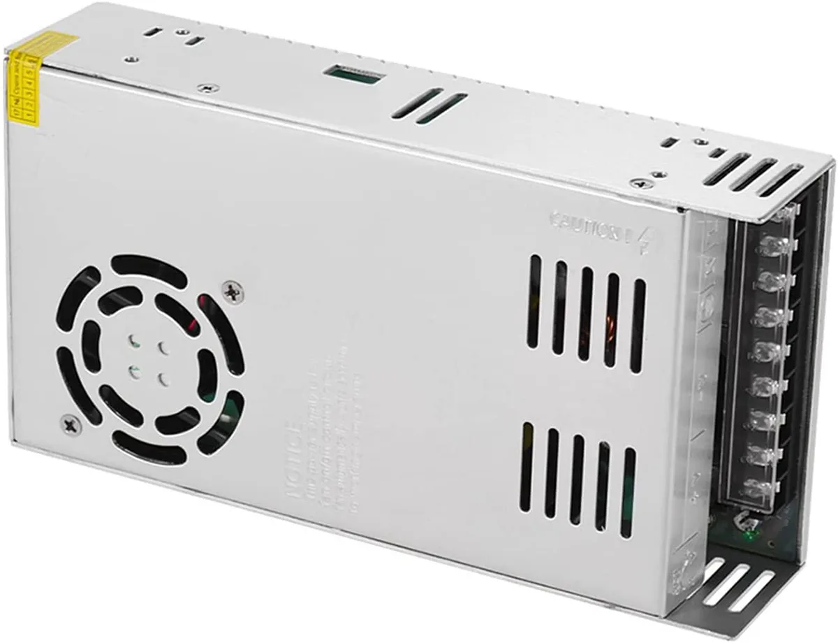 Rectangular stainless steel switching power supply, 21.5 by 11.5 by 5 cm, natural cooling, AC input selector switch visible