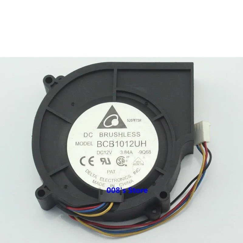 Compact silver fin stack CPU cooler with black blower fan, 97 by 87 by 25 mm