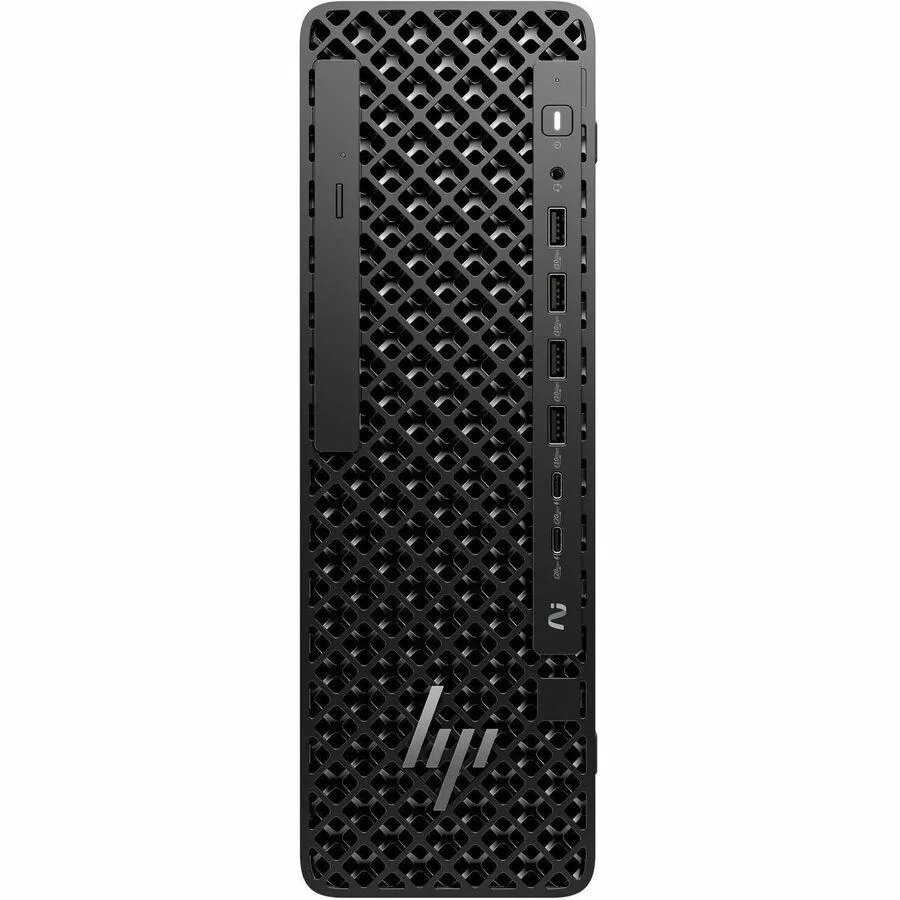 Black small-form-factor desktop tower with keyboard and mouse