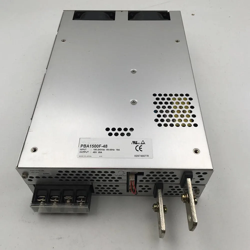 Rectangular silver metal ATX power supply unit with ventilation grilles and rear connector panel