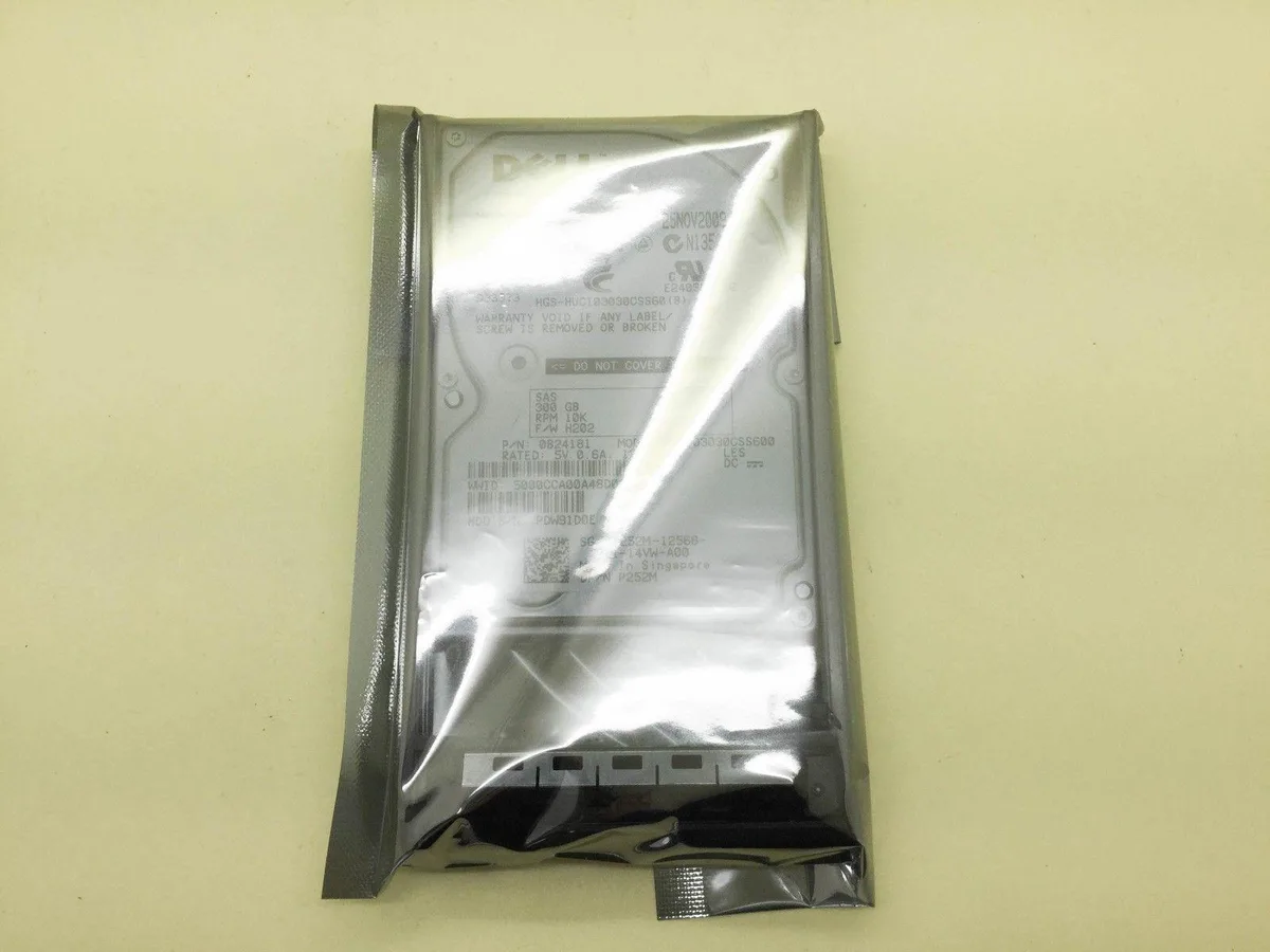 Small silver rectangular 2.5 inch SAS hard drive with label