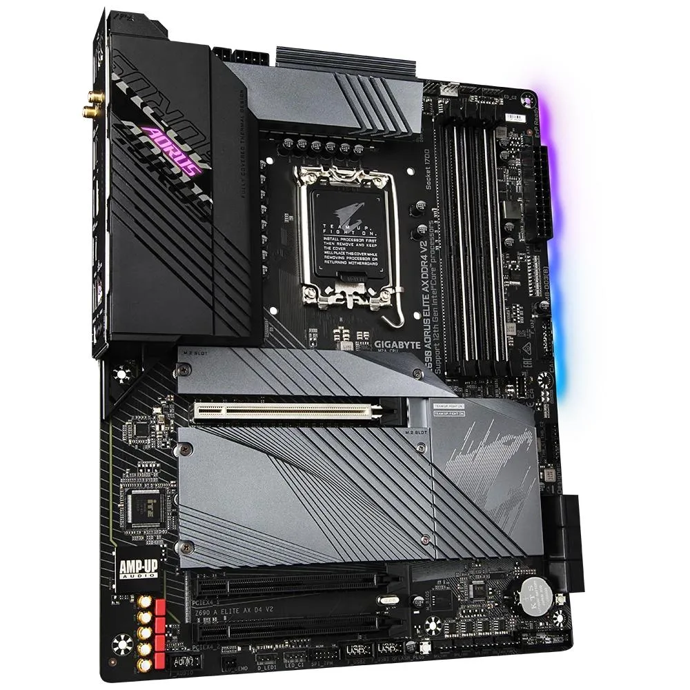ATX motherboard with black PCB, silver heatsinks, four DDR4 slots, RGB lighting