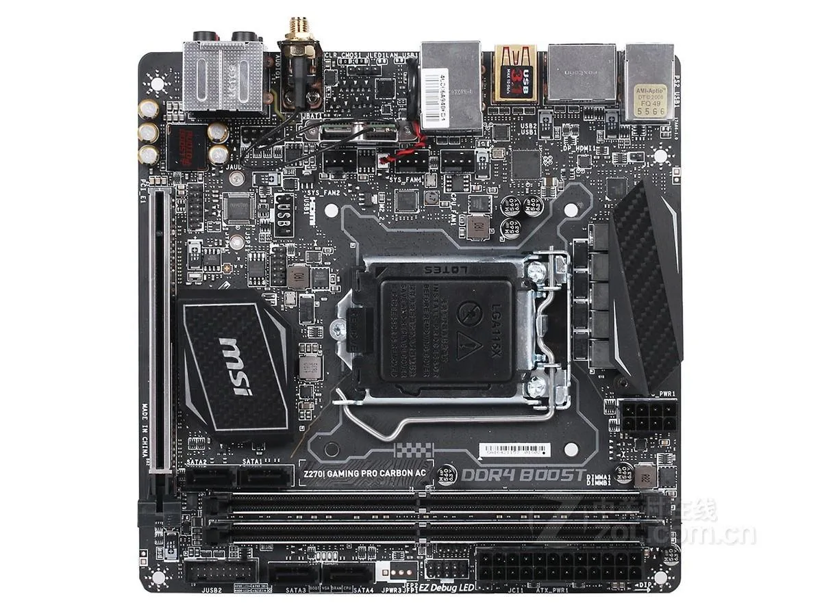Compact Mini-ITX motherboard, dark carbon-finish PCB with silver heatsinks and rear I/O shield