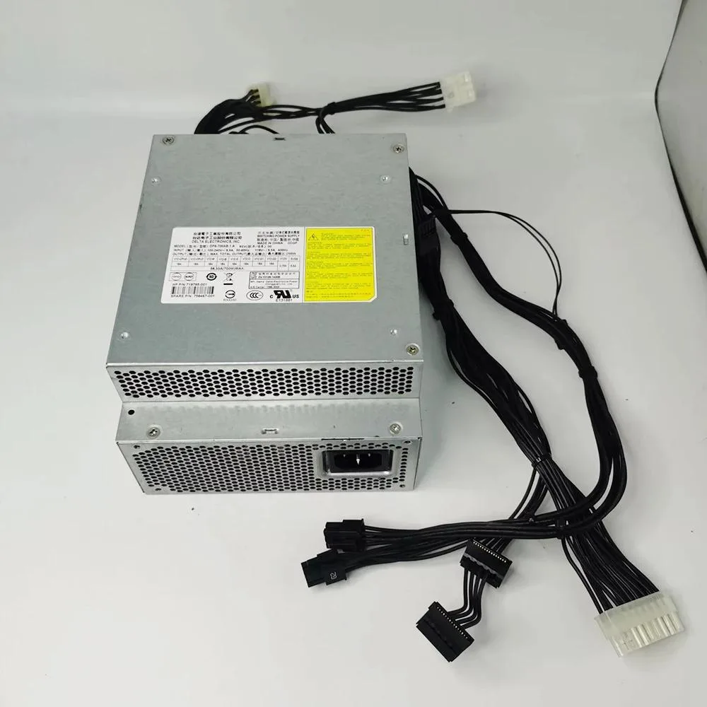 Silver rectangular ATX power supply unit with ventilation grille and power socket