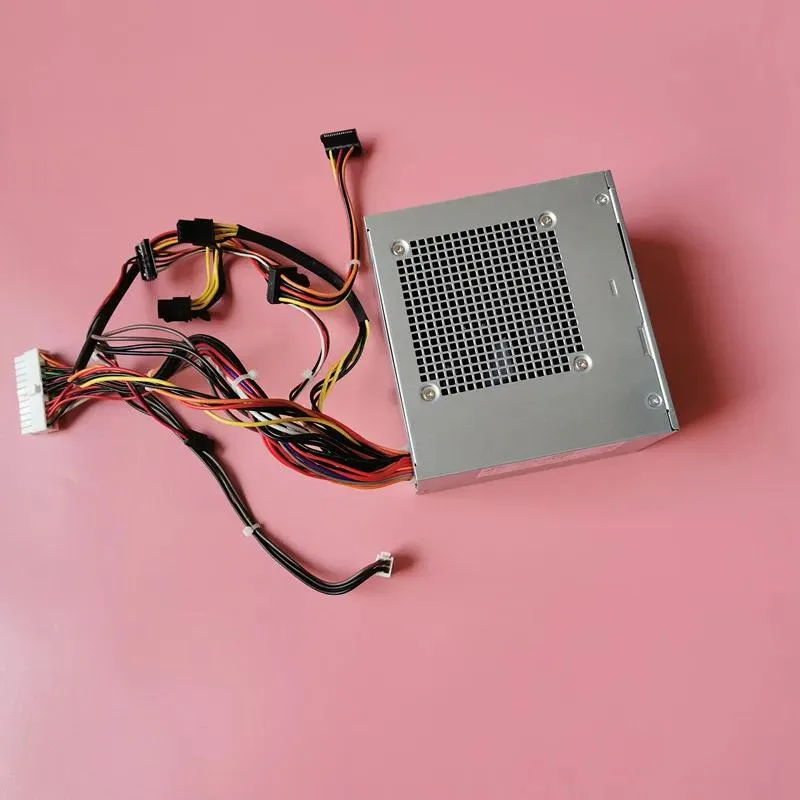 Rectangular silver ATX power supply unit with fan grille and cable bundle