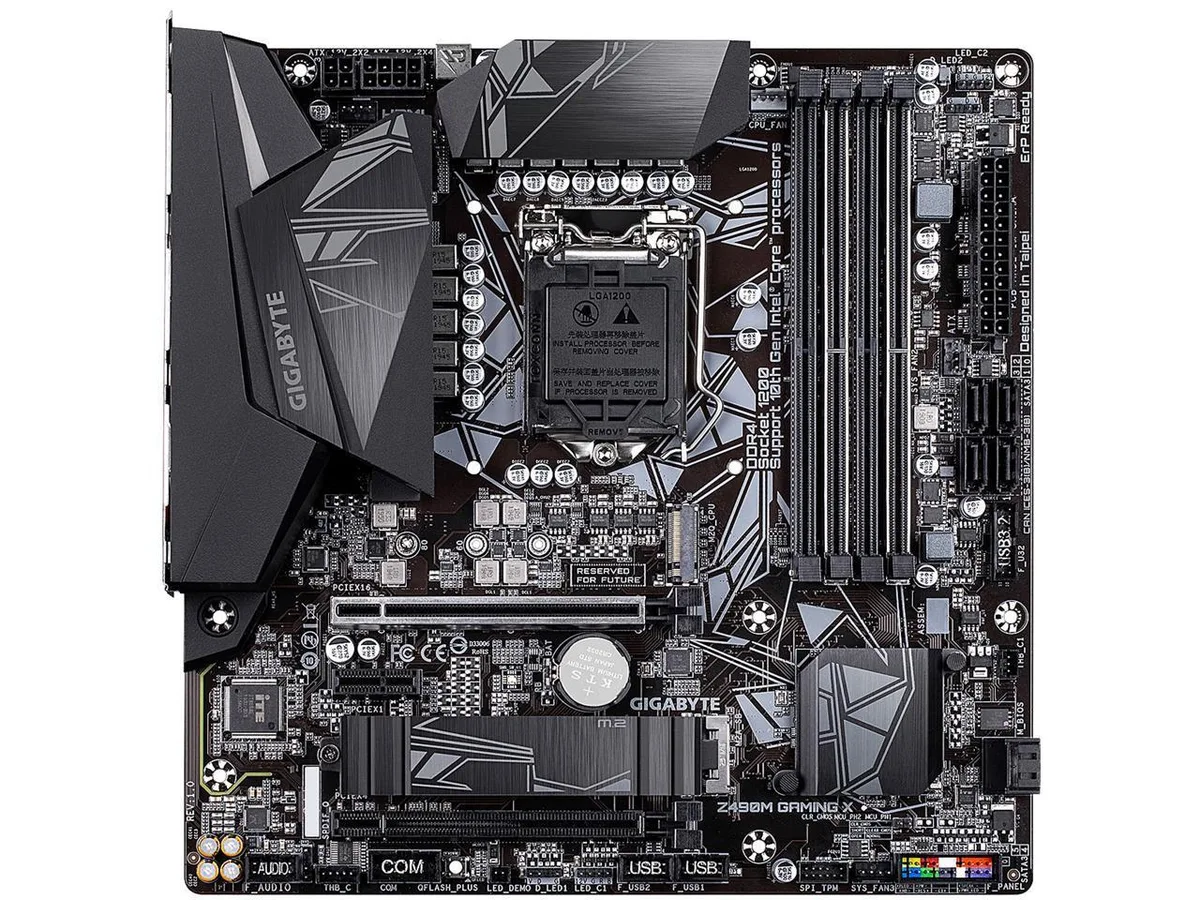 Micro-ATX motherboard dark PCB silver heatsinks rear I/O shield