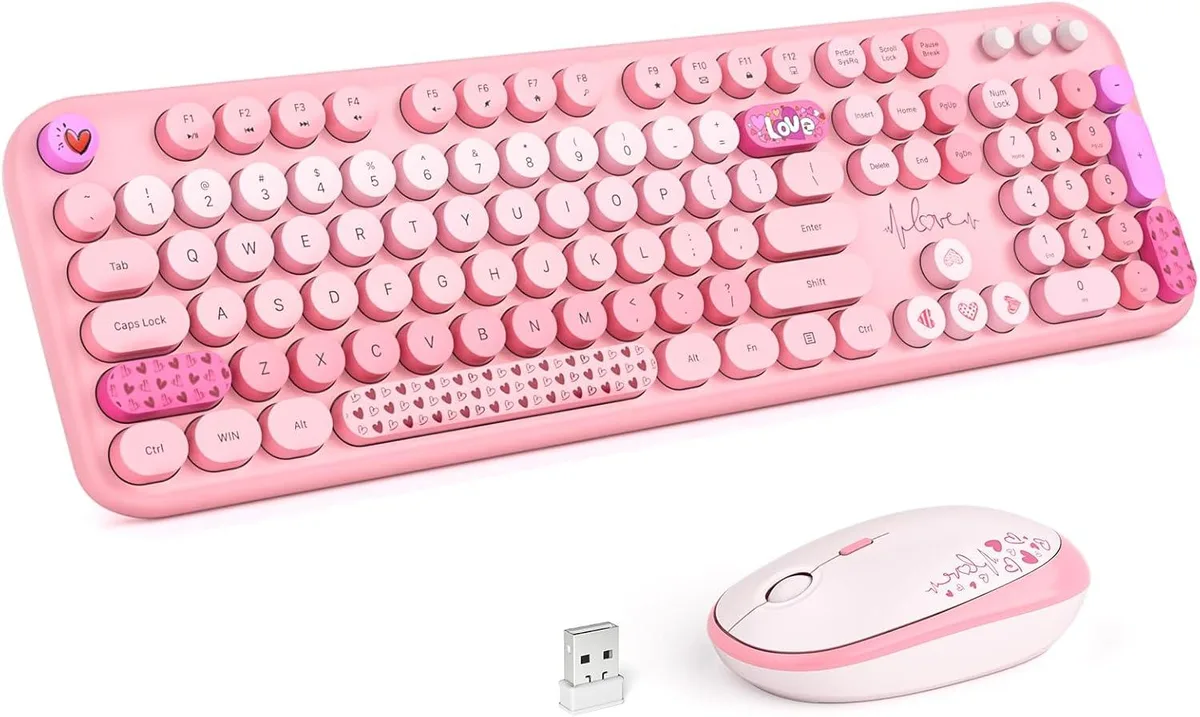 Pink heart-patterned full-size wireless keyboard with matching contoured mouse