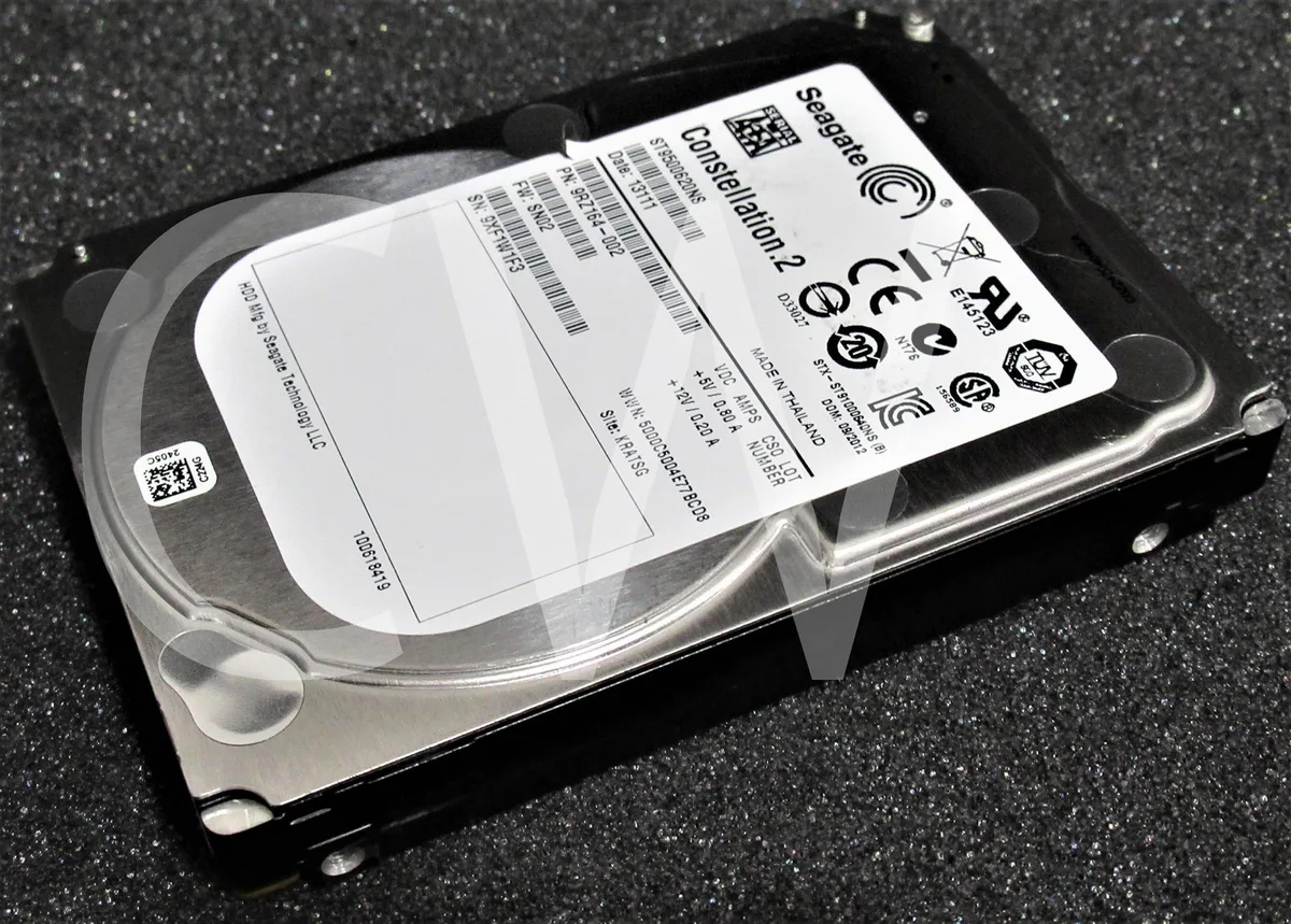Silver 2.5 inch SATA hard drive with exposed circuit board