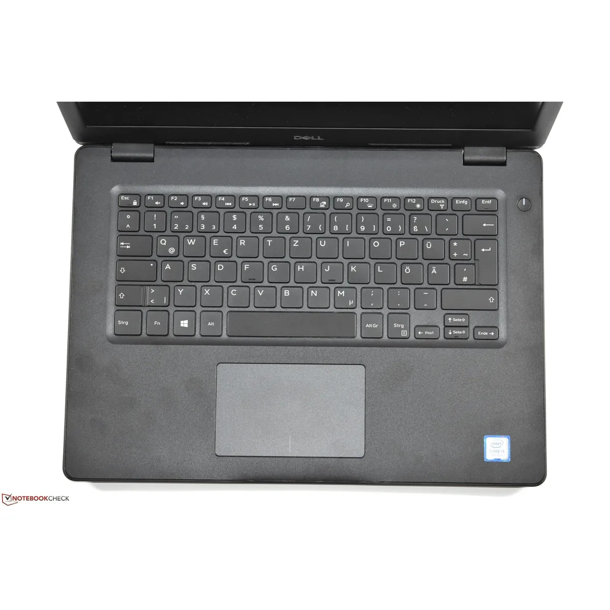Black Dell Latitude 3490 laptop closed on a plain background