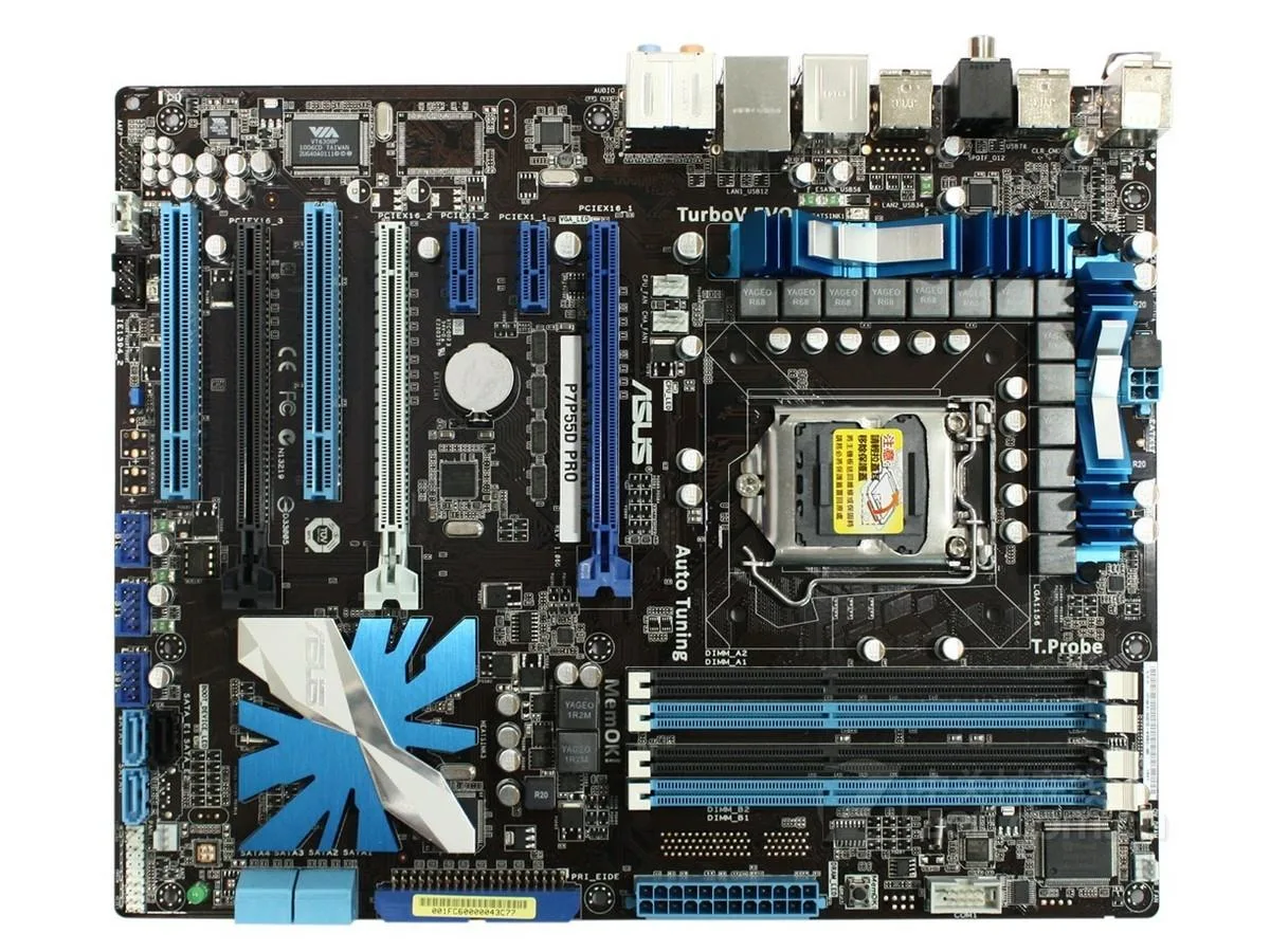 ATX motherboard with black PCB and blue slots, LGA 1156 socket, DDR3 memory banks, SATA ports, I/O shield included
