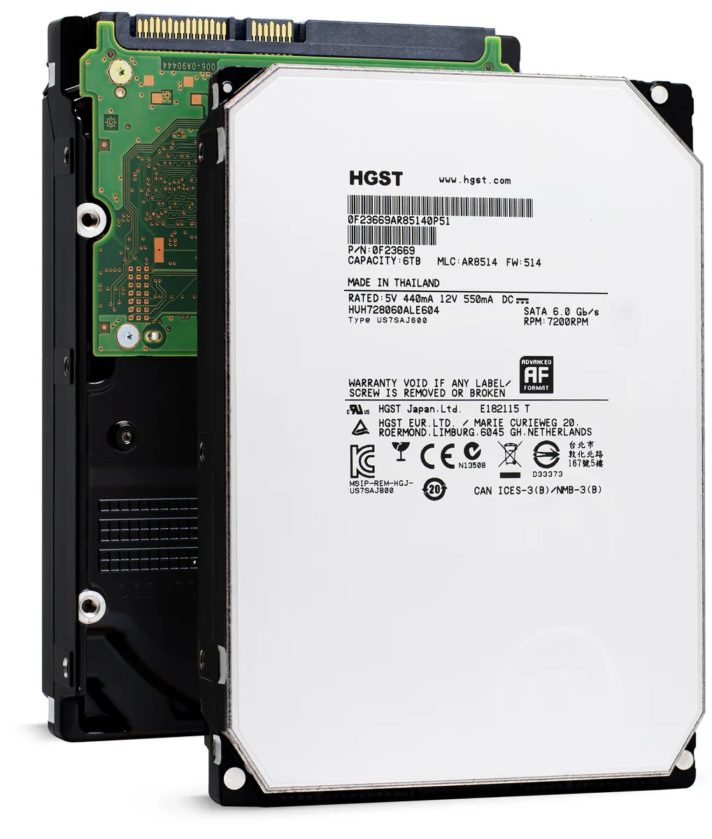 Silver 3.5 inch bare hard drive with circuit board visible