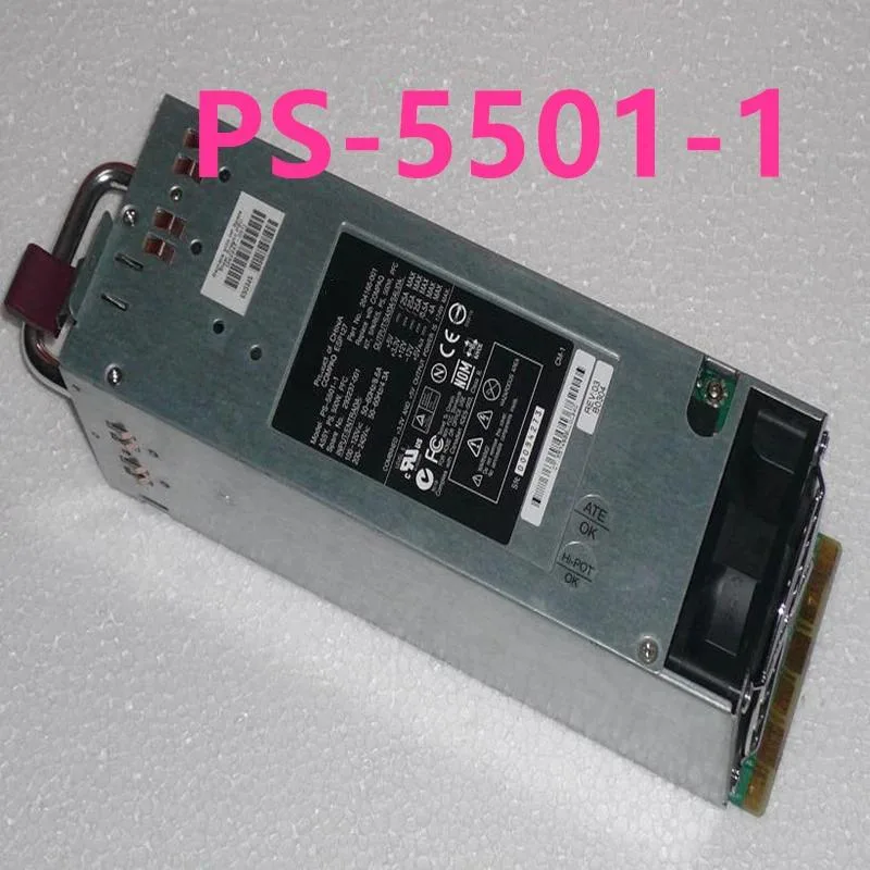 Rectangular silver ATX power supply unit with ventilation grille and label showing model numbers