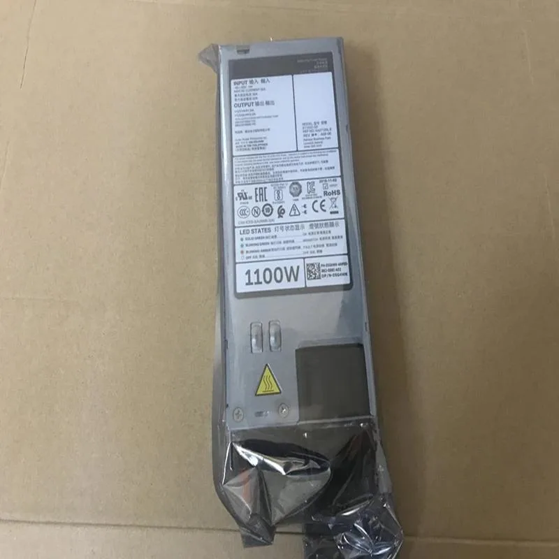 Rectangular silver ATX power supply unit with fan grille and rear power socket