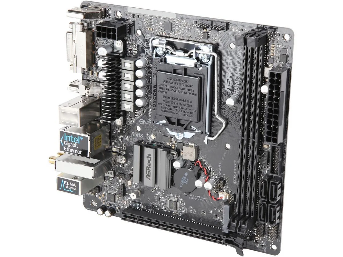 Green Mini-ITX board with silver CPU socket, two black memory slots, blue M.2 slot, silver I/O shield, black heatsink, gold PCIe slot