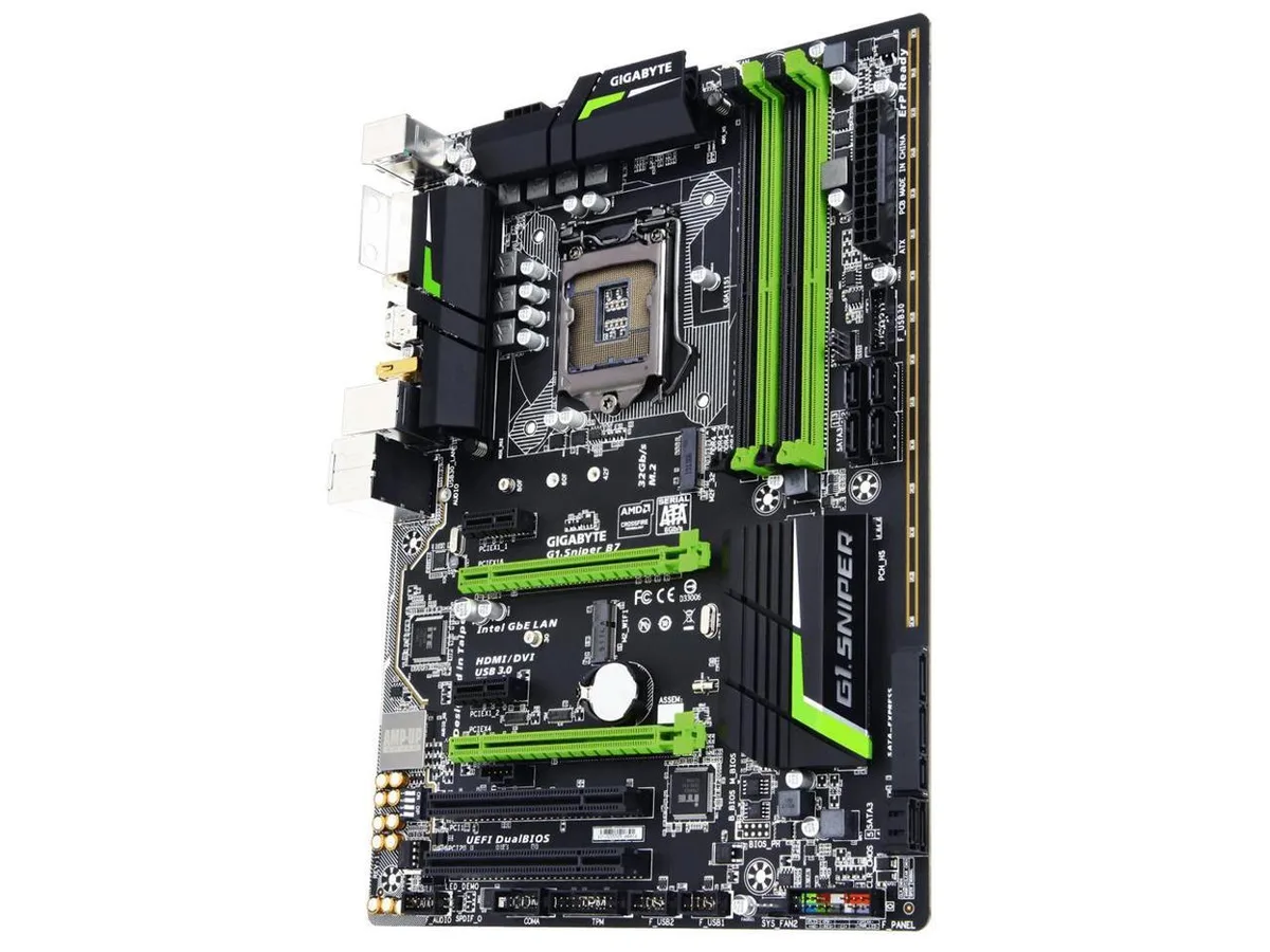 ATX motherboard in black with grey PCIe slots and metal-reinforced audio section