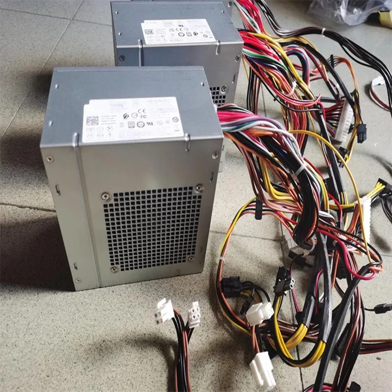 Rectangular ATX power supply unit with metal casing and rear fan grille