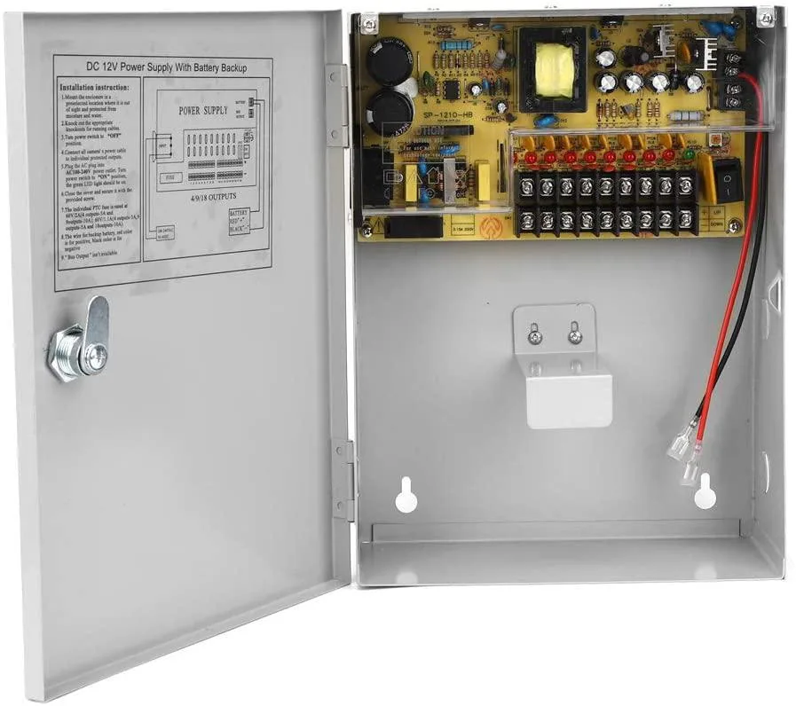 Rectangular metal enclosure with vertical mounting tabs, matte grey finish, nine output terminals visible