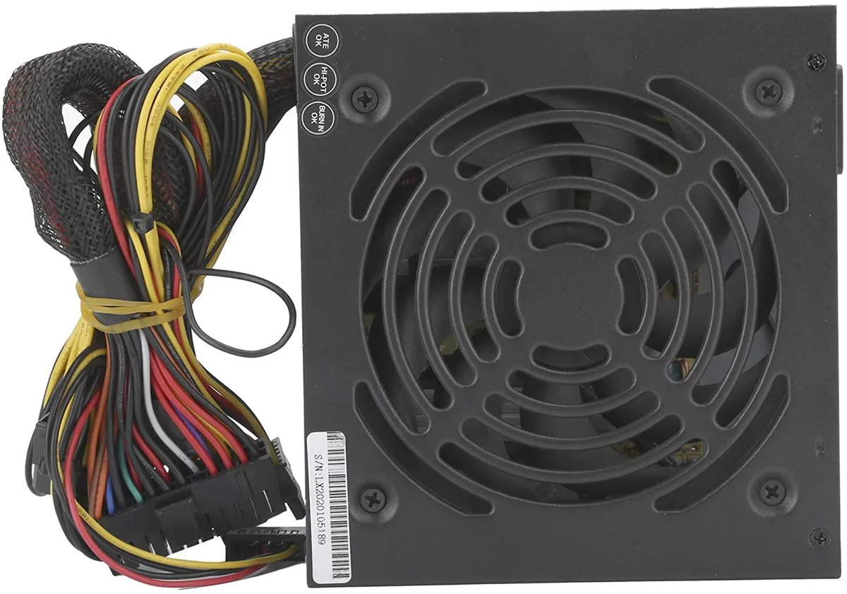 Rectangular metal PSU unit with 12 cm fan, US power cord, and multiple cable connectors visible