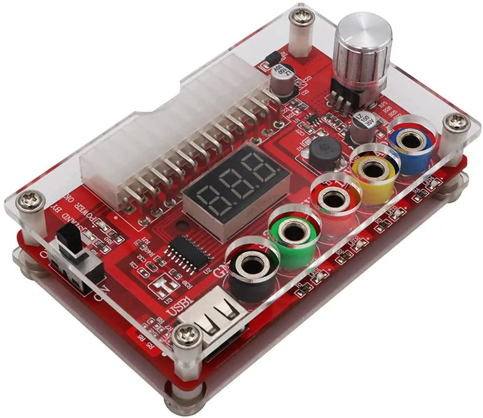 Red ATX 24 pin breakout board with adjustable voltage knob inside clear acrylic case