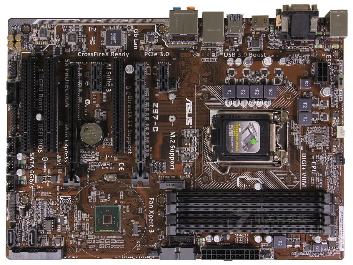 Green ATX motherboard with silver CPU socket and black memory slots