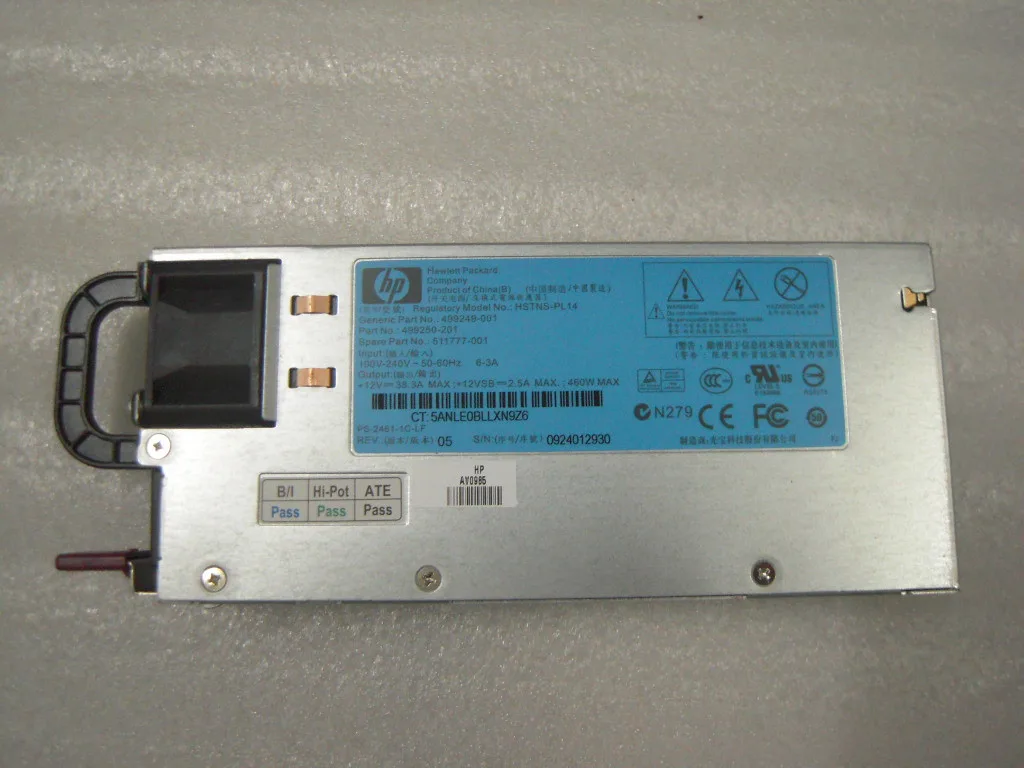 Rectangular silver server power supply unit with hot-plug handle and ventilation grille
