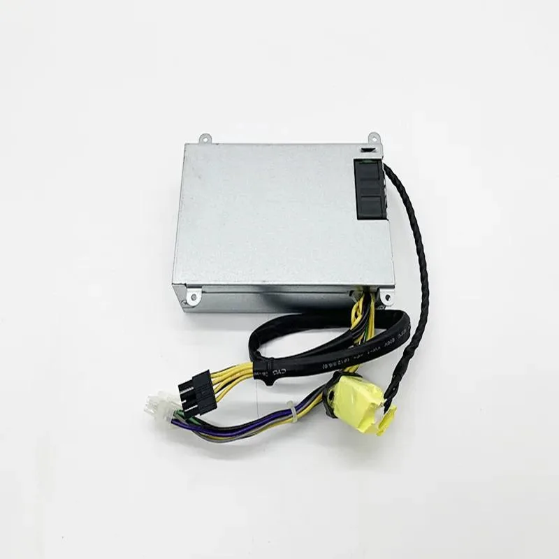Rectangular silver ATX power supply unit with ventilation grille and cables