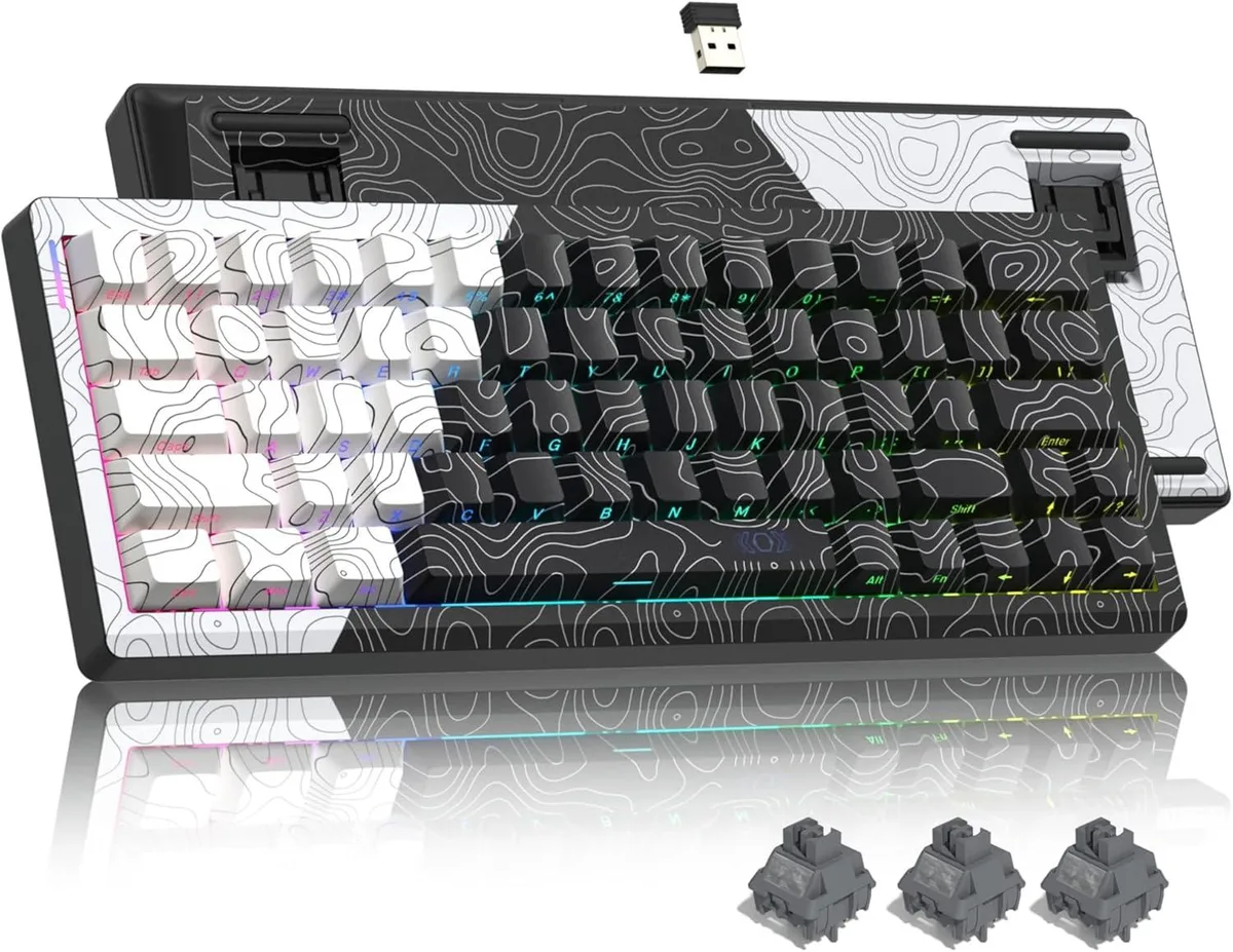 Compact 60 percent wireless keyboard in black and white topographic design with arrow keys and RGB lighting
