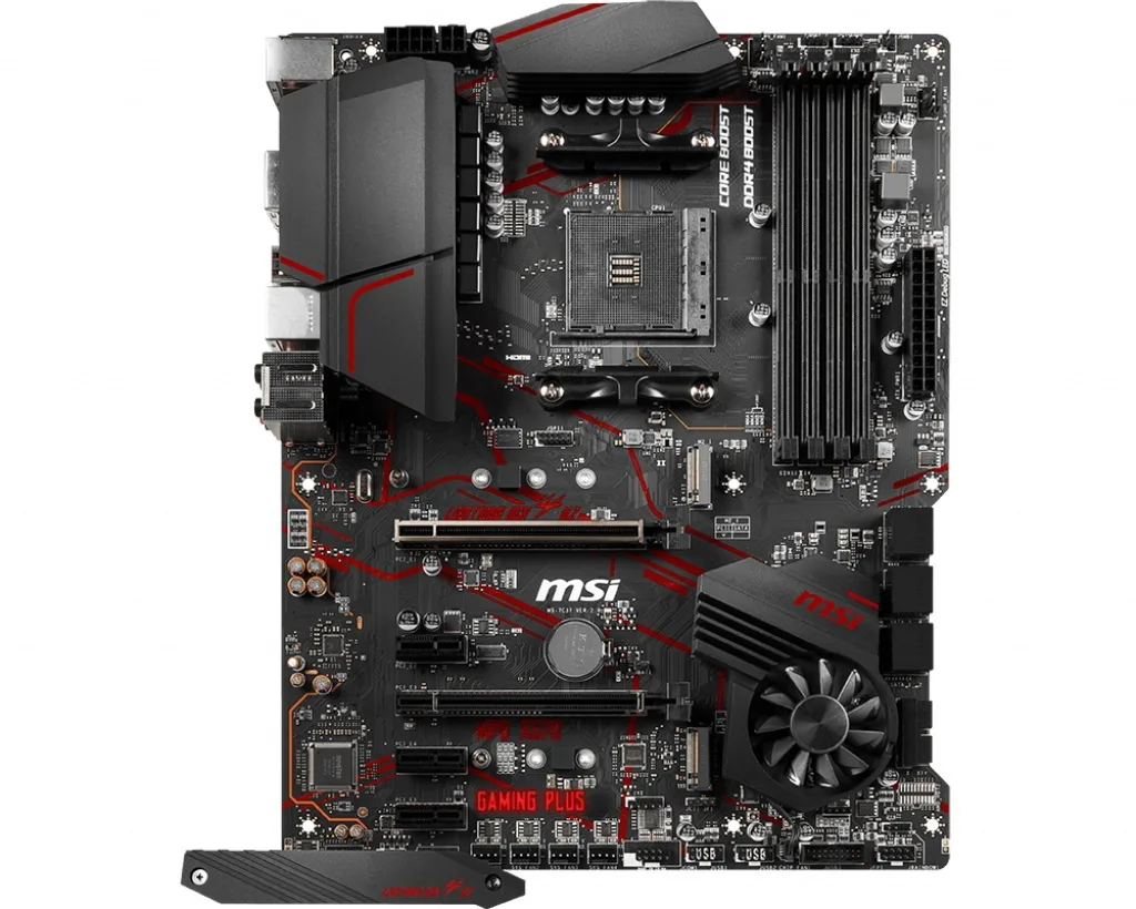 ATX motherboard in black with silver heatsinks and a small active fan on the chipset