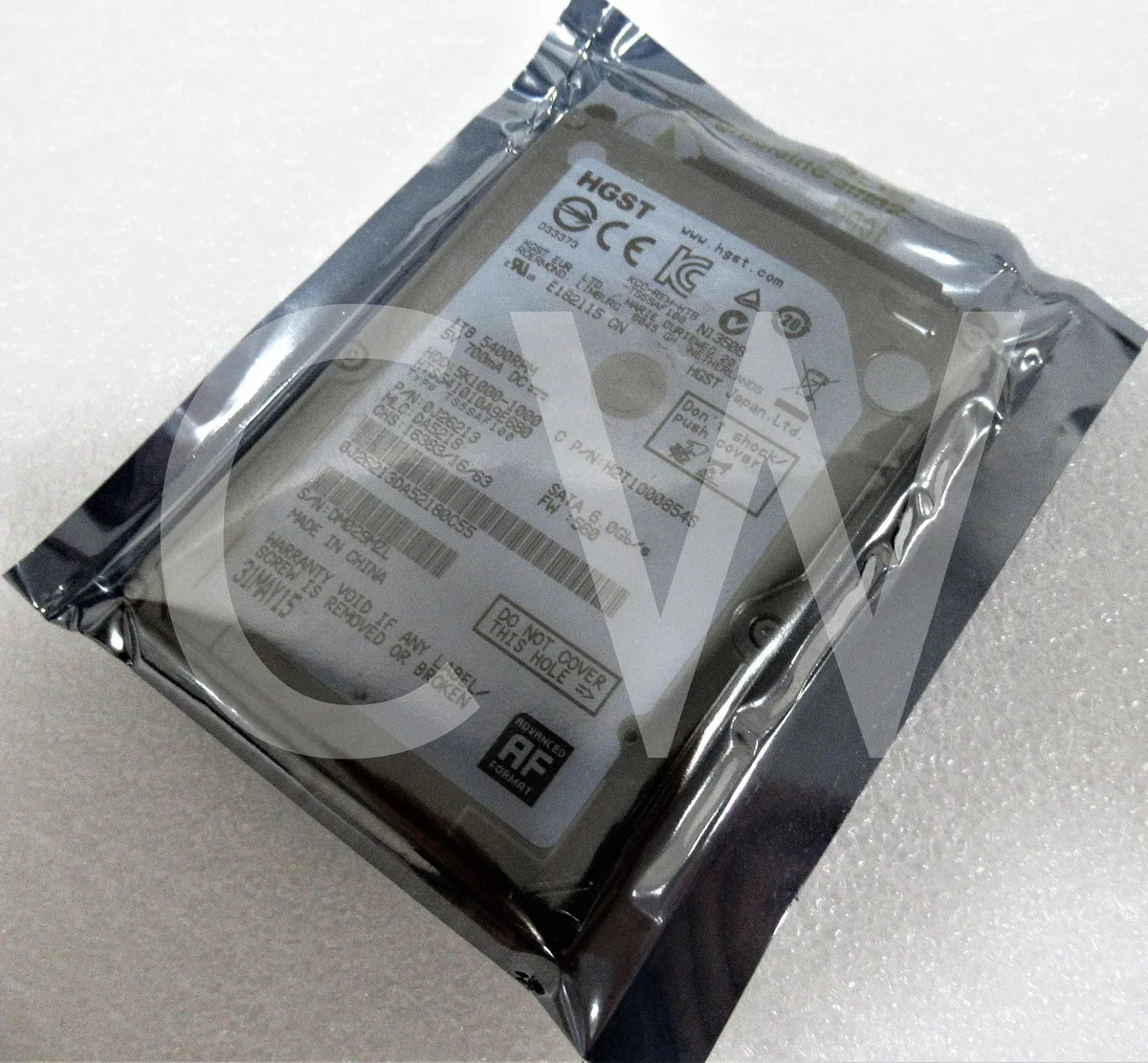 Silver rectangular 2.5 inch SATA hard drive with label