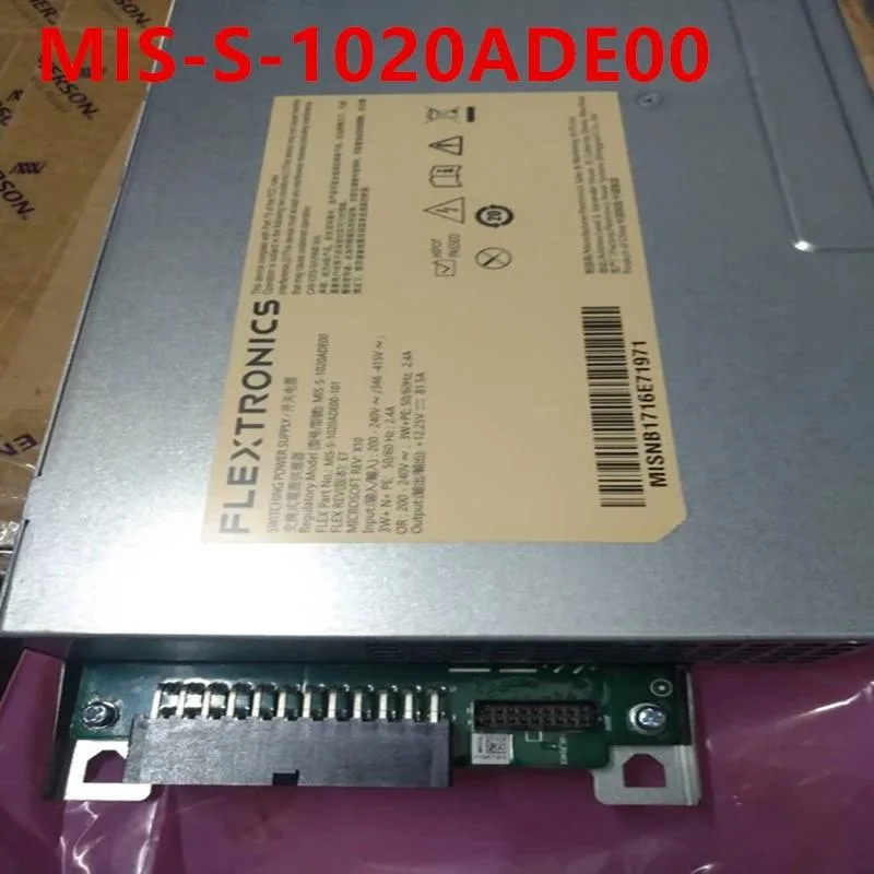 Rectangular ATX power supply unit, matte black metal casing, cooling fan visible on one side