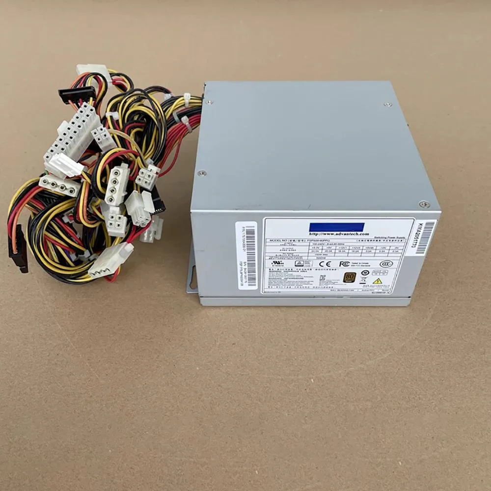 Silver rectangular ATX power supply unit with label showing 500W 60