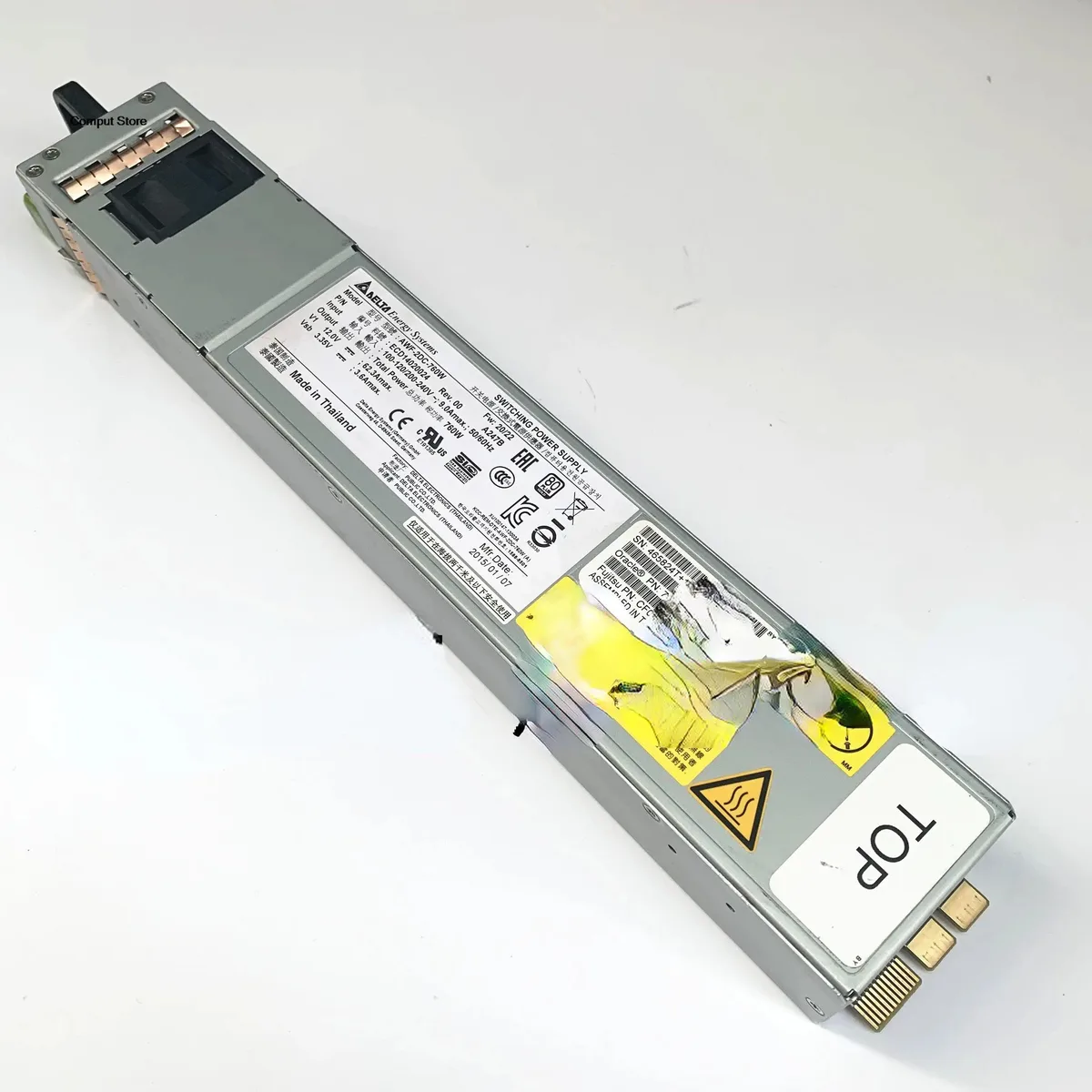 Rectangular ATX power supply unit, matte metal finish, label shows model numbers