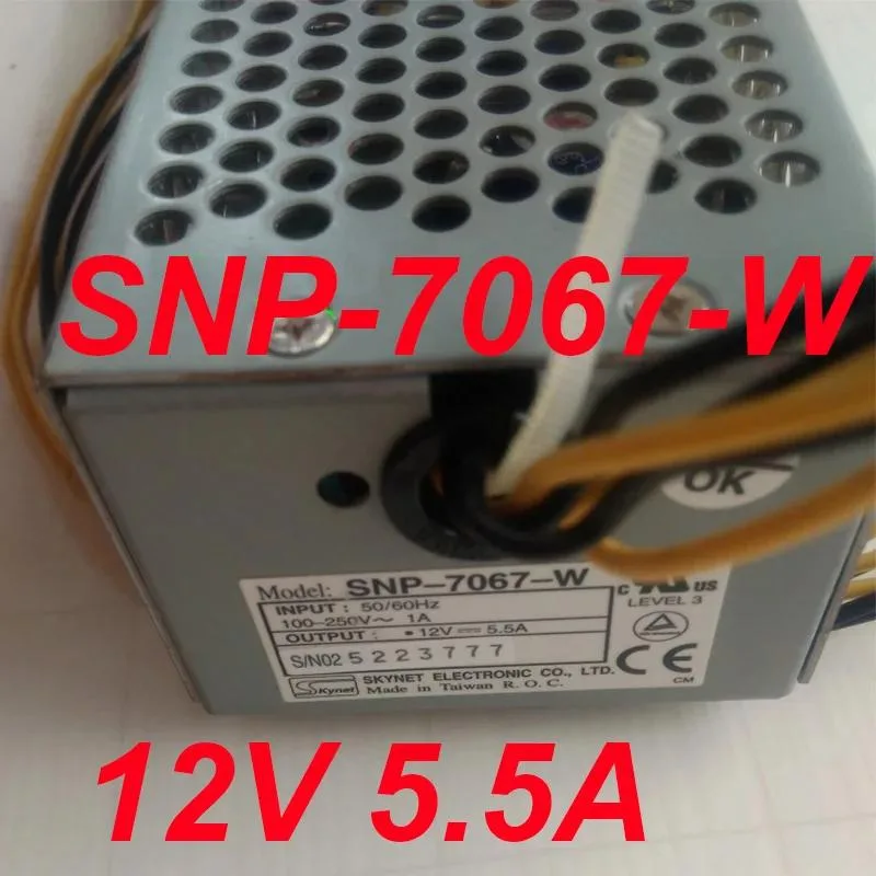 Black ATX power supply unit with label showing 12V 5.5A